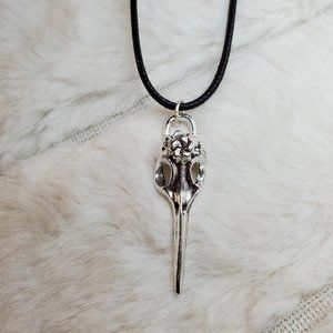 Bird skull plague doctor charm necklace.